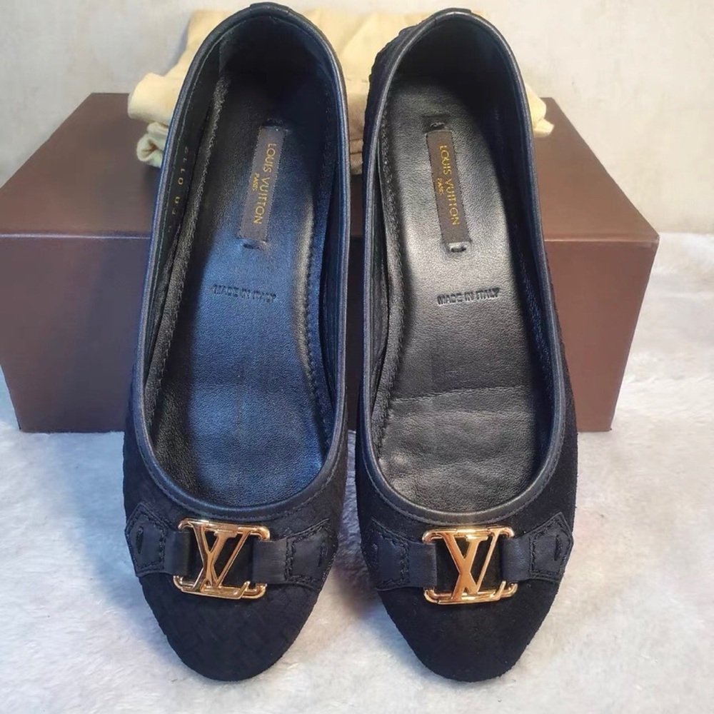 Louis Vuitton Black Flats with Gold Accents